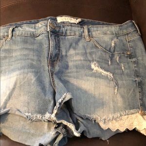 Lace trimmed denim shorts